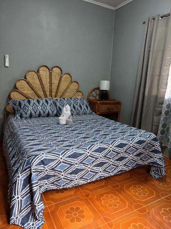 Postel nebo postele na pokoji v ubytování Seaside Blue Inn