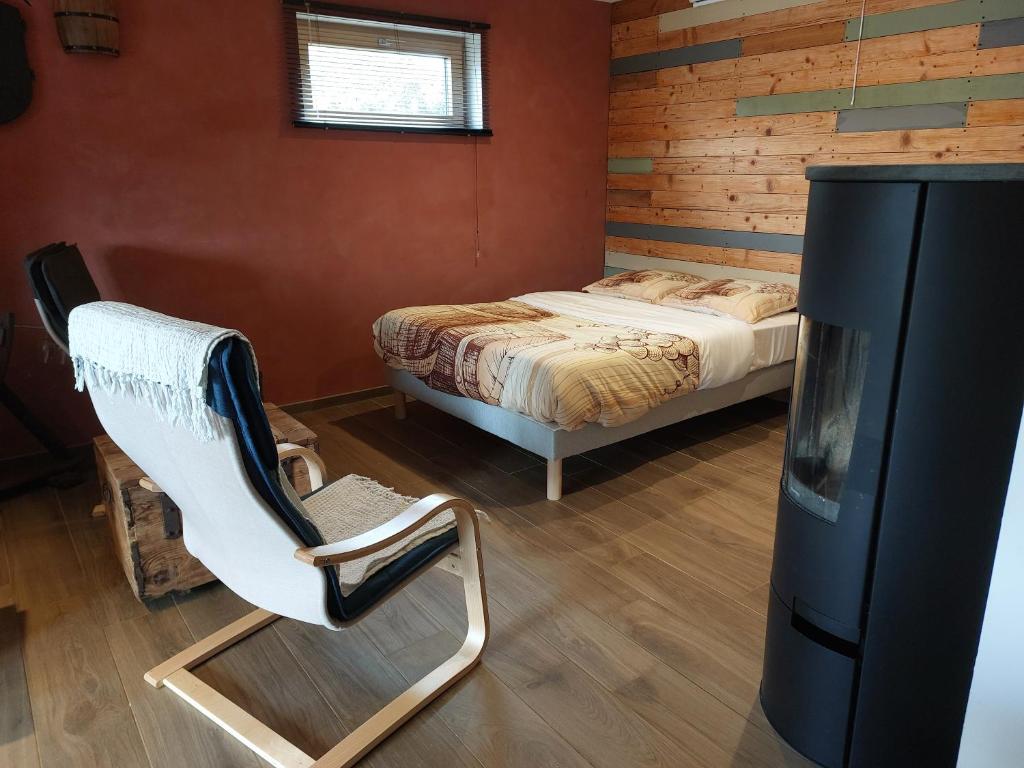 Postel nebo postele na pokoji v ubytování Winstub du vigneron