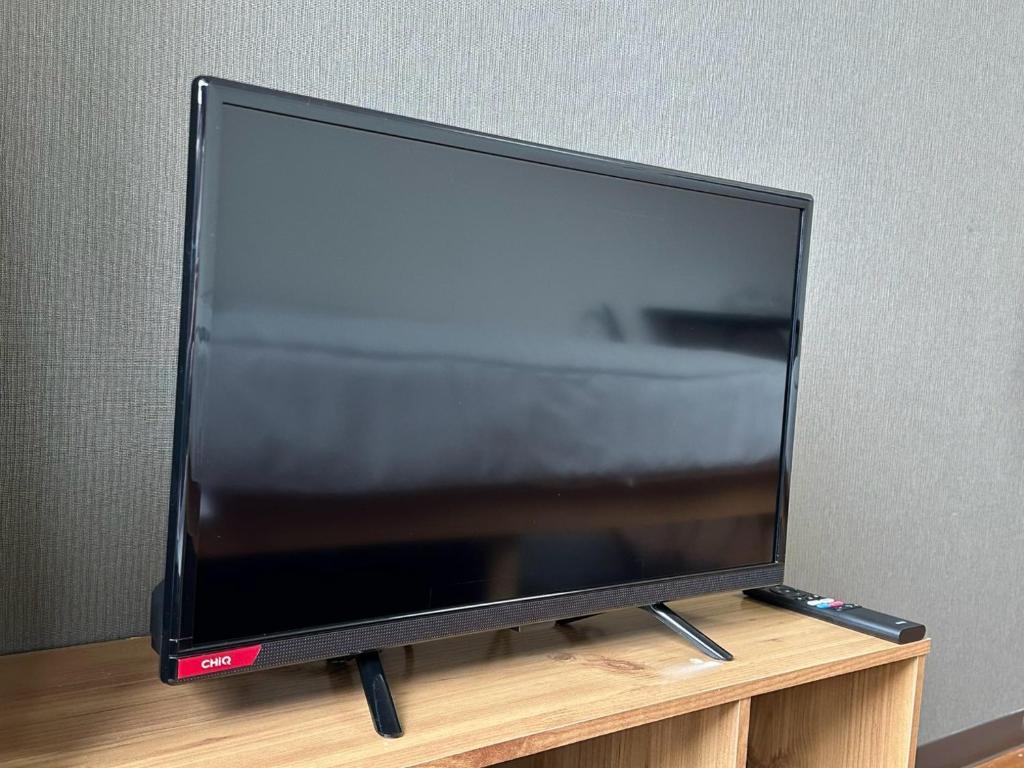 TV a/nebo společenská místnost v ubytování ハレノヒハクシマ