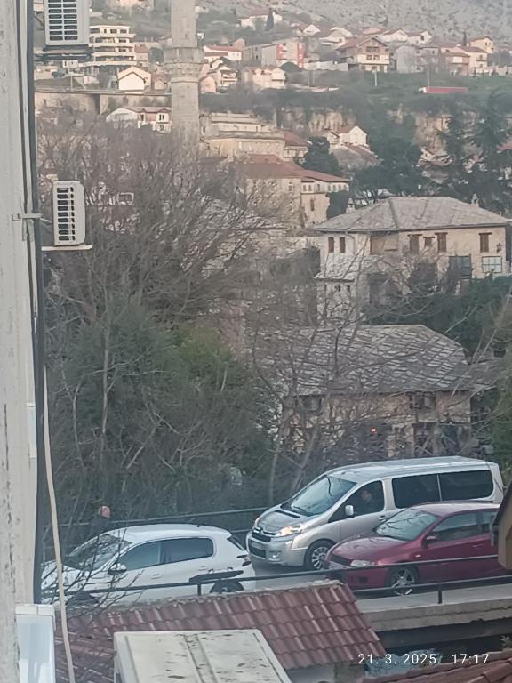 a group of cars parked in a parking lot at West Star in Visoko