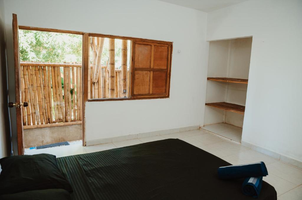 Postel nebo postele na pokoji v ubytování Hostal Casa Celeste