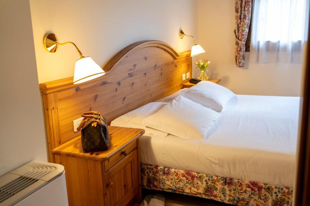 Postel nebo postele na pokoji v ubytování Park Hotel Villa Giustinian