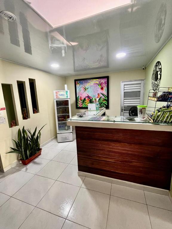 Kuchyň nebo kuchyňský kout v ubytování HOTEL KINDI Orito