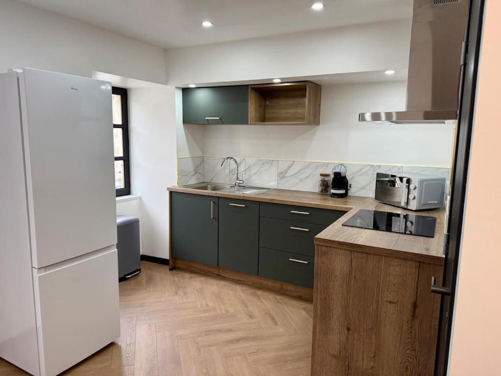 Una cocina o zona de cocina en Le RC