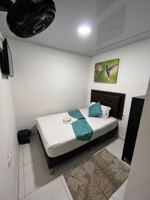Postel nebo postele na pokoji v ubytování HOTEL KINDI Orito