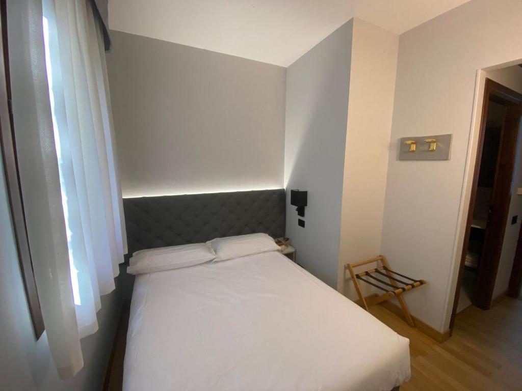 Postel nebo postele na pokoji v ubytování Park Hotel Villa Giustinian