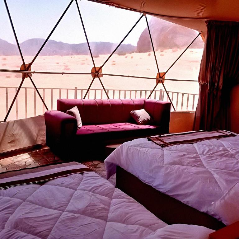 Postel nebo postele na pokoji v ubytování Wadi rum vaggie camp