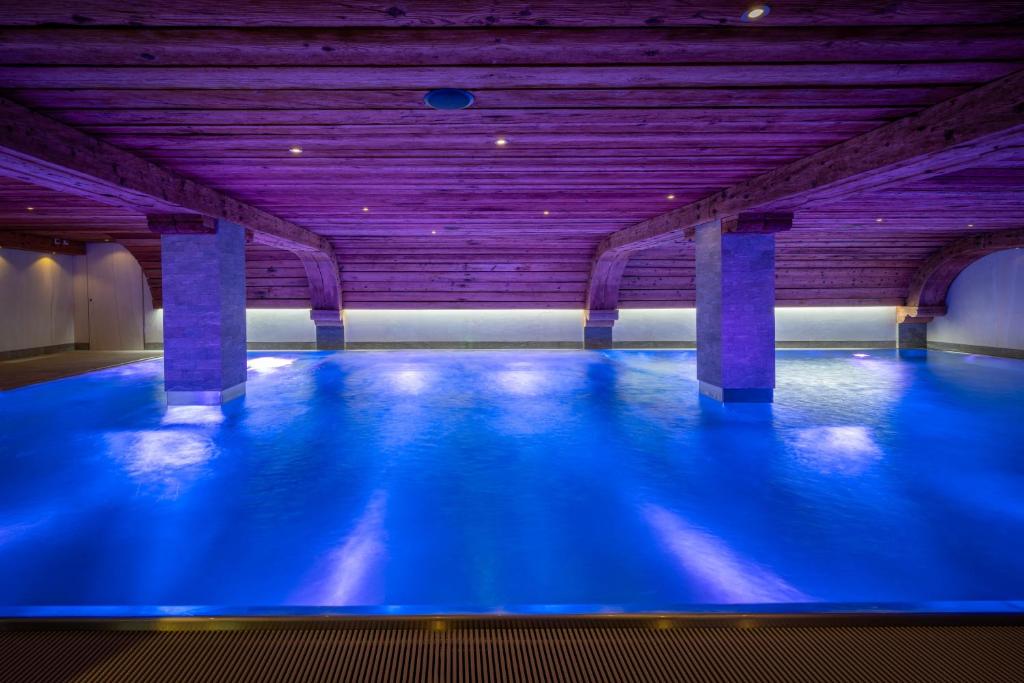 Der Swimmingpool an oder in der Nähe von Arca Aparthotel &amp; Spa