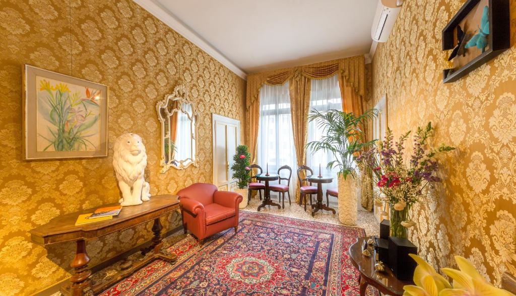 TV a/nebo společenská místnost v ubytování Friendly Venice Suites