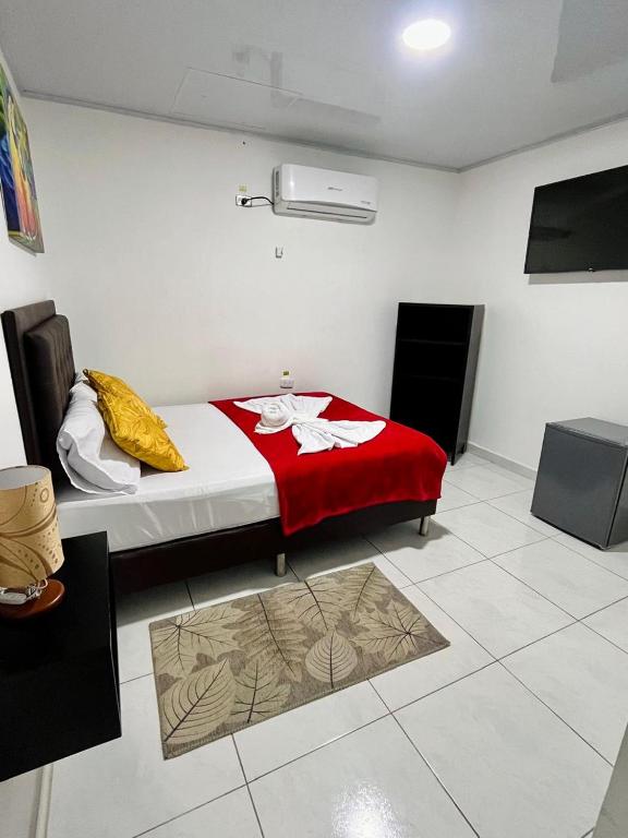 Postel nebo postele na pokoji v ubytování HOTEL KINDI Orito