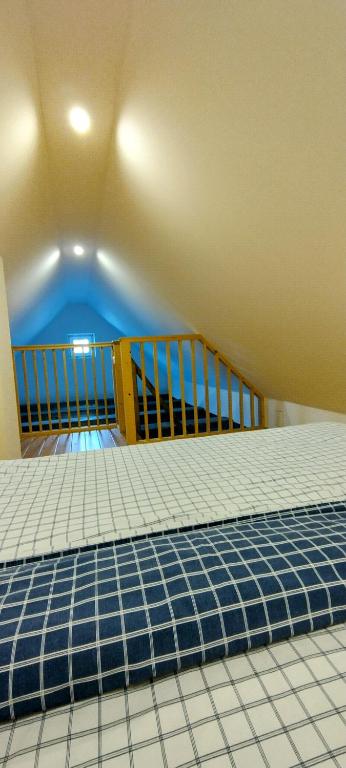Postel nebo postele na pokoji v ubytování Apartmány Křivoklát