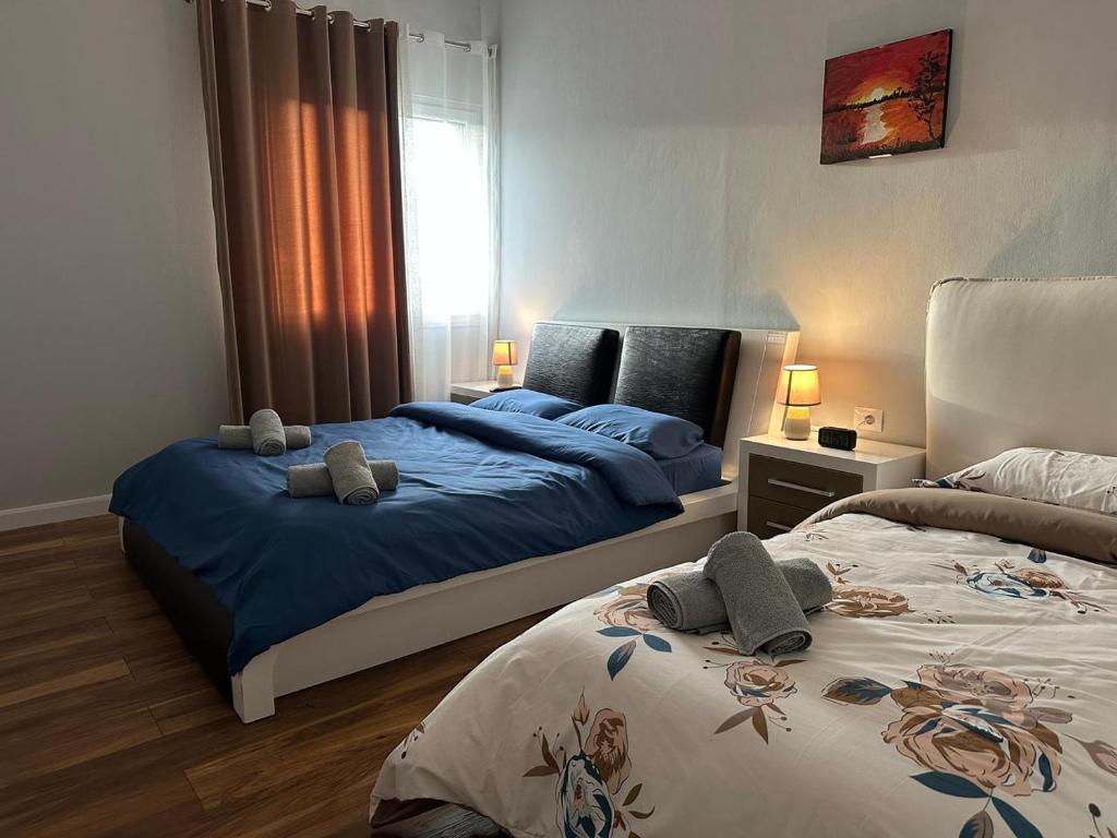 Postel nebo postele na pokoji v ubytování Agnesa Apartament
