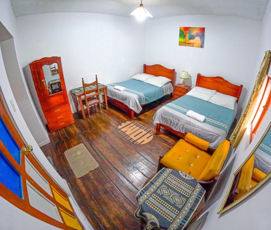 Postel nebo postele na pokoji v ubytování Colonial House Inn