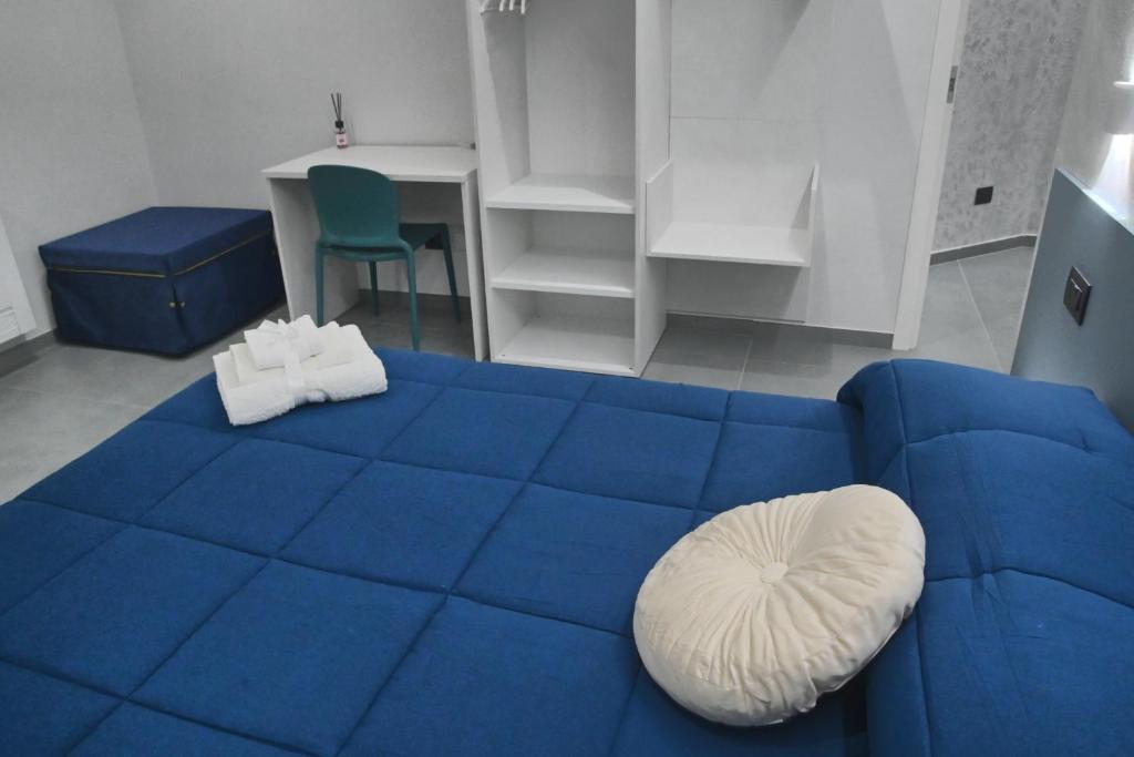 Postel nebo postele na pokoji v ubytování Affittacamere ONE