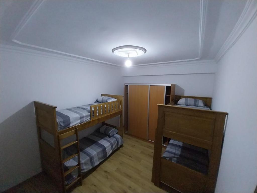 Postel nebo postele na pokoji v ubytování Eftalya Hostel