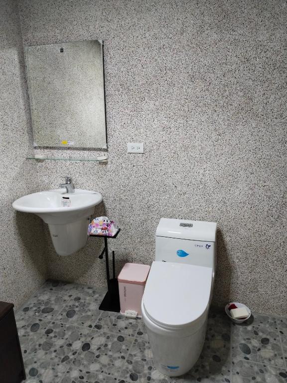 Vannituba majutusasutuses Shi Qian Zai Homestay