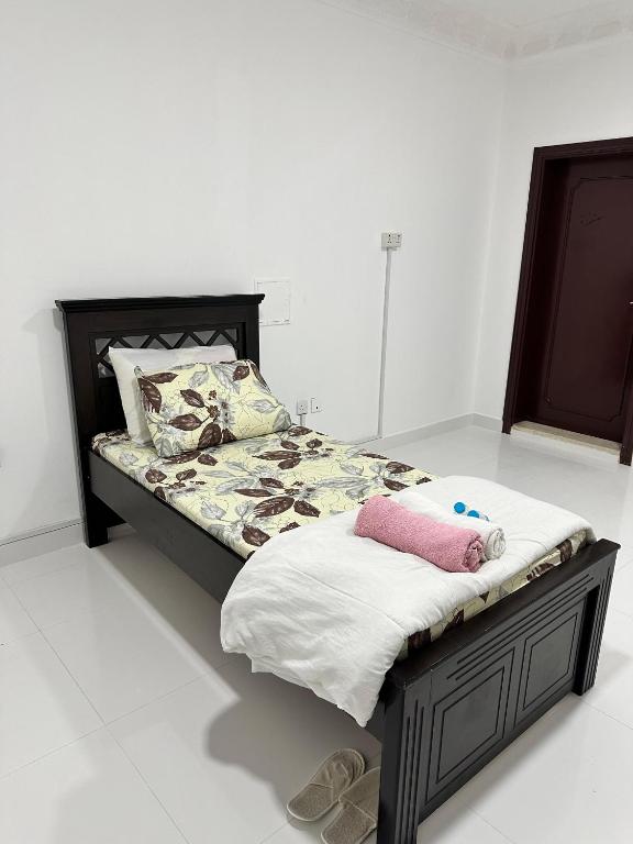 Postel nebo postele na pokoji v ubytování International Abu-Dhabi Hostel Villa