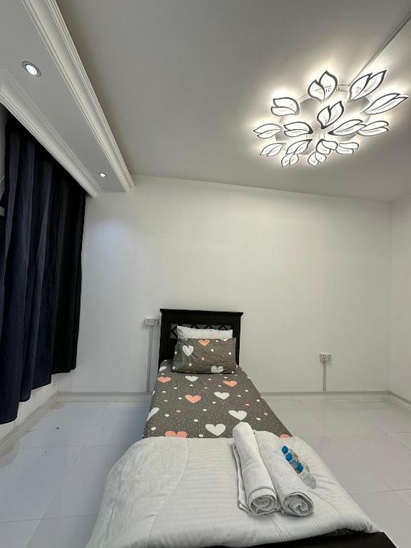 Postel nebo postele na pokoji v ubytování International Abu-Dhabi Hostel Villa