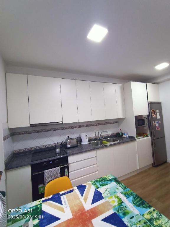Kuchyň nebo kuchyňský kout v ubytování Habitación privada Tenefe