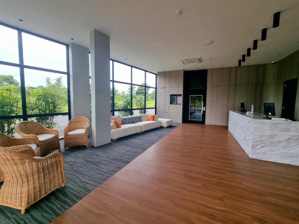 Posezení v ubytování Roxy Hotel Malihah