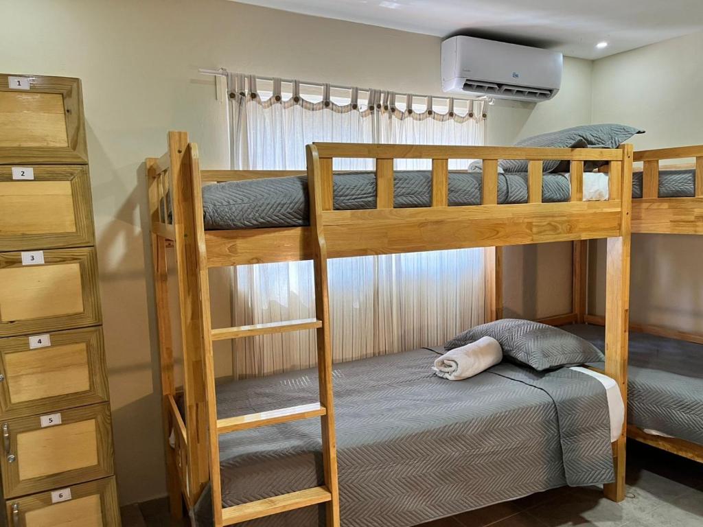 Postel nebo postele na pokoji v ubytování Hotel Bavaro