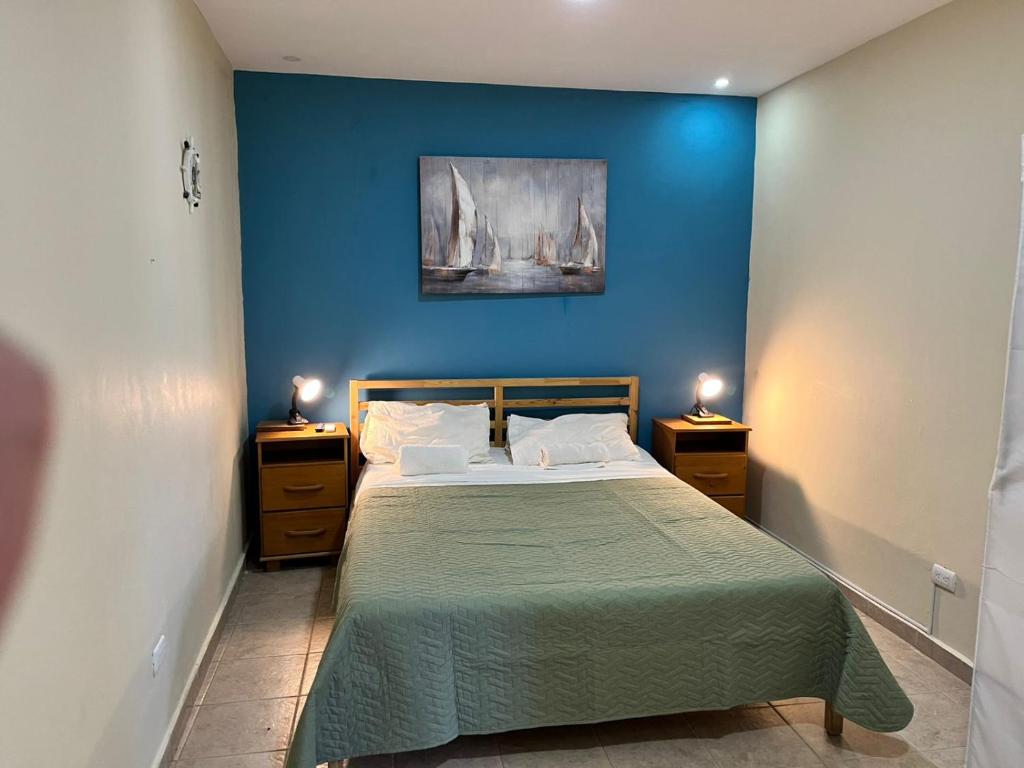 Postel nebo postele na pokoji v ubytování Hotel Bavaro