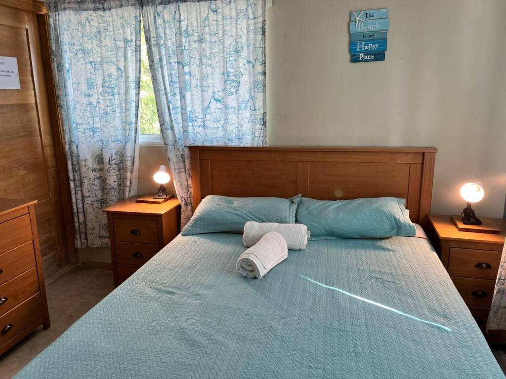 Postel nebo postele na pokoji v ubytování Hotel Bavaro