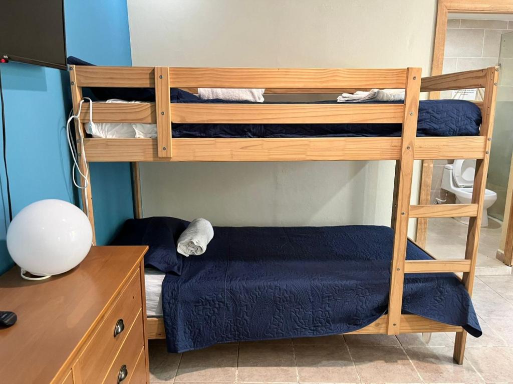 Postel nebo postele na pokoji v ubytování Hotel Bavaro