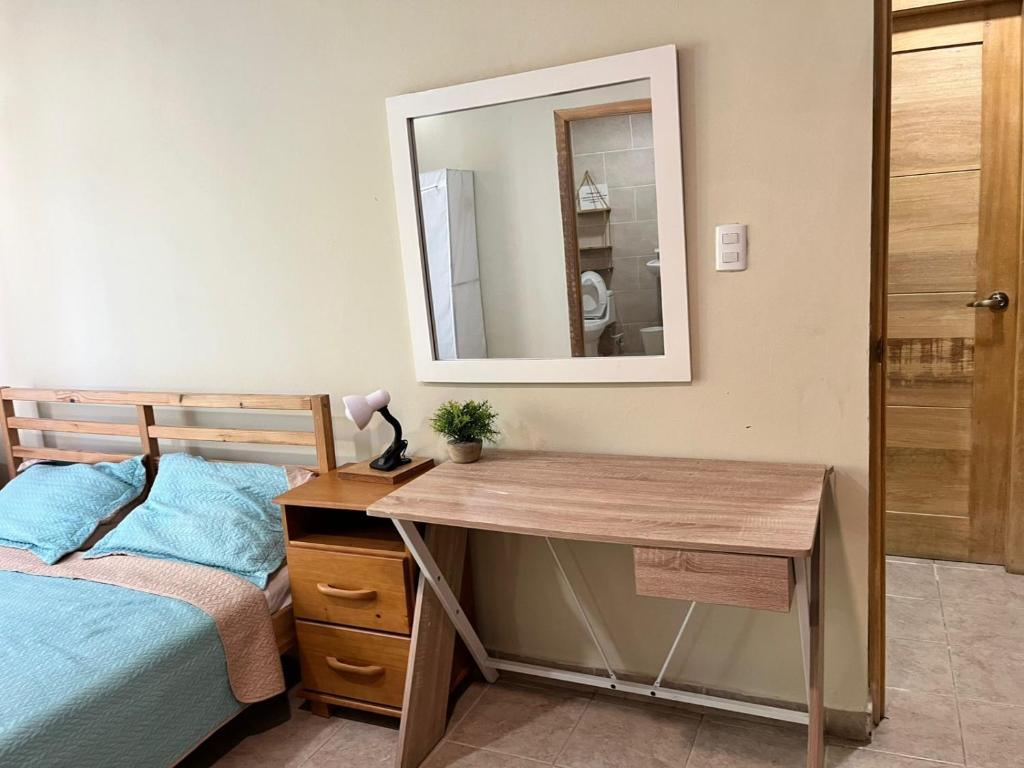 Postel nebo postele na pokoji v ubytování Hotel Bavaro