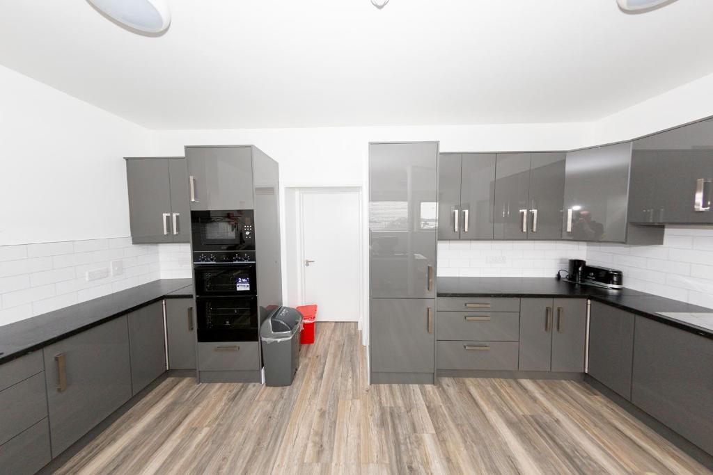 Kuchyň nebo kuchyňský kout v ubytování KCM Urban Retreats