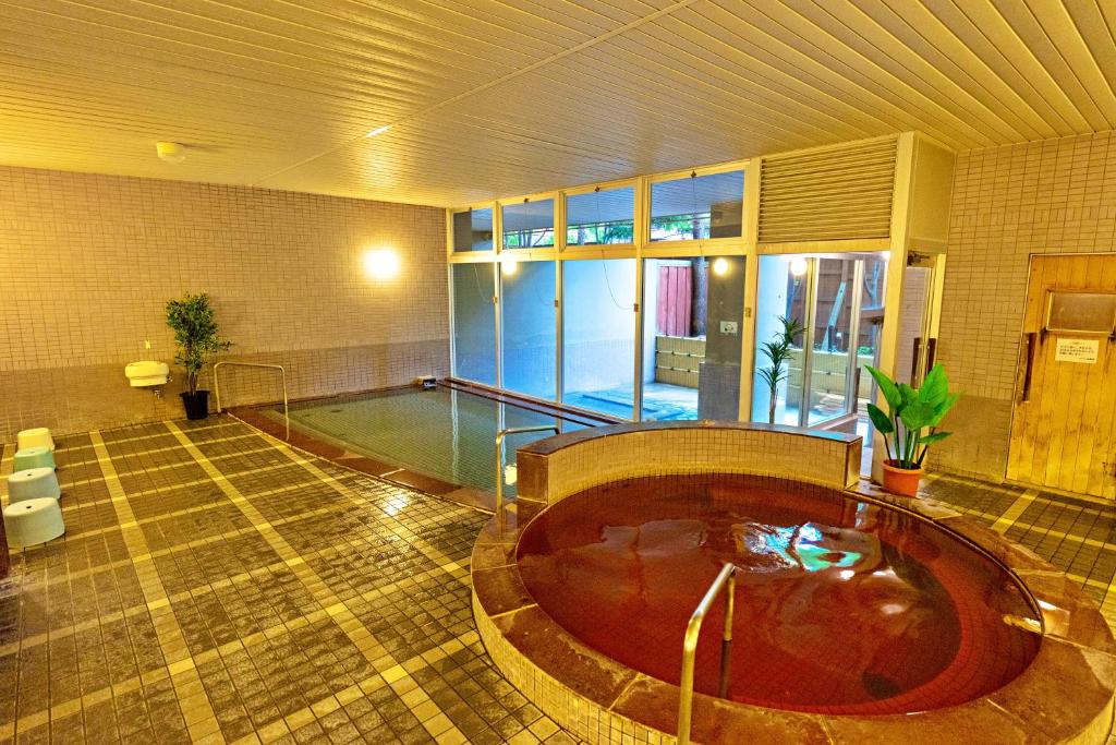 Bazén v ubytování glampark Otaru Hanaemi Hokkaido nebo v jeho okolí