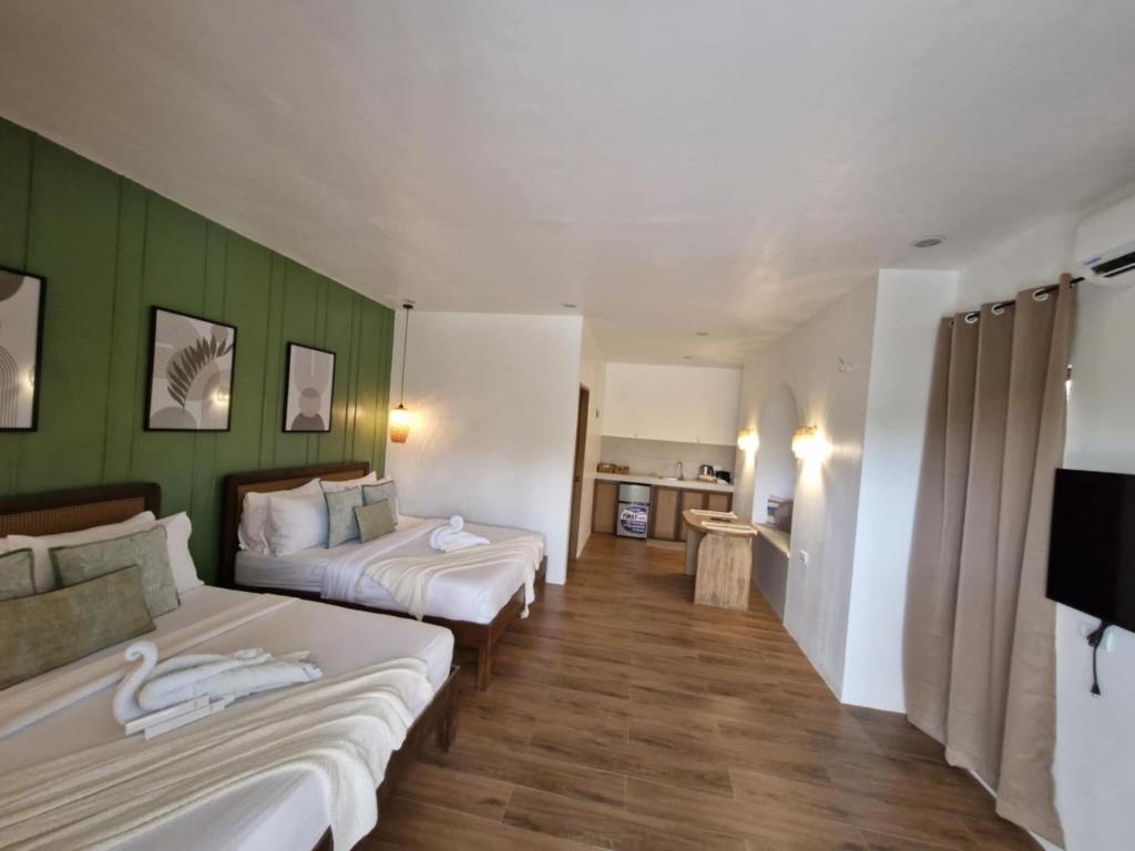 Postel nebo postele na pokoji v ubytování Villa Alessandra Homestay