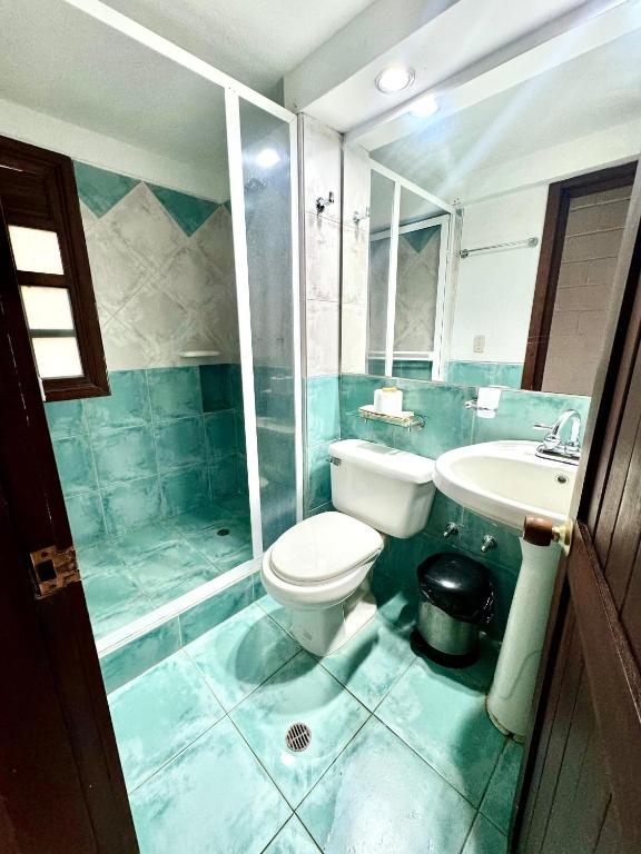 Koupelna v ubytování Hotel MACA lago calima
