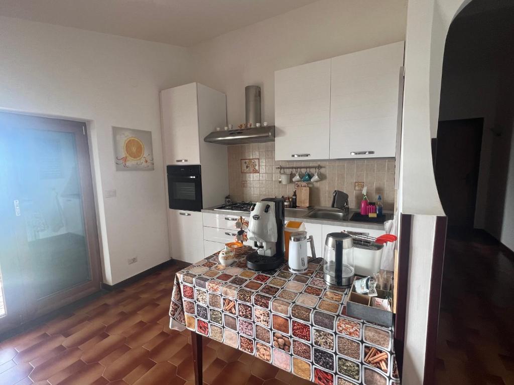 Kuchyň nebo kuchyňský kout v ubytování B&B Villa Reginella
