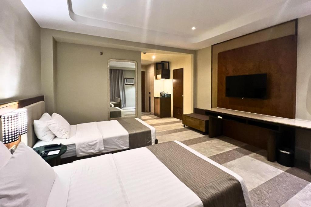 TV a/nebo společenská místnost v ubytování Coron Westown Resort