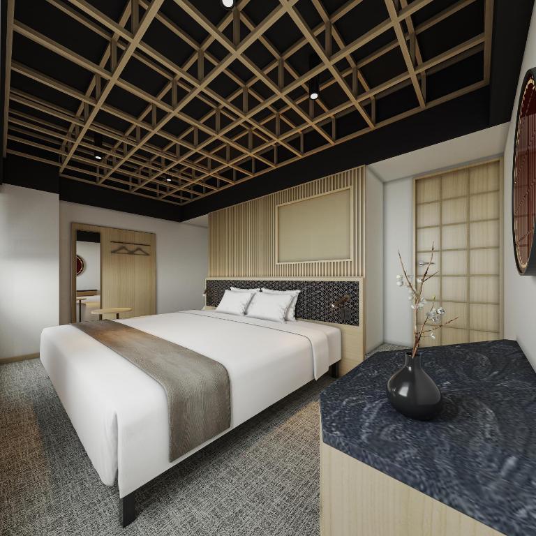 Postel nebo postele na pokoji v ubytování Fujinomiya Fujikyu Hotel