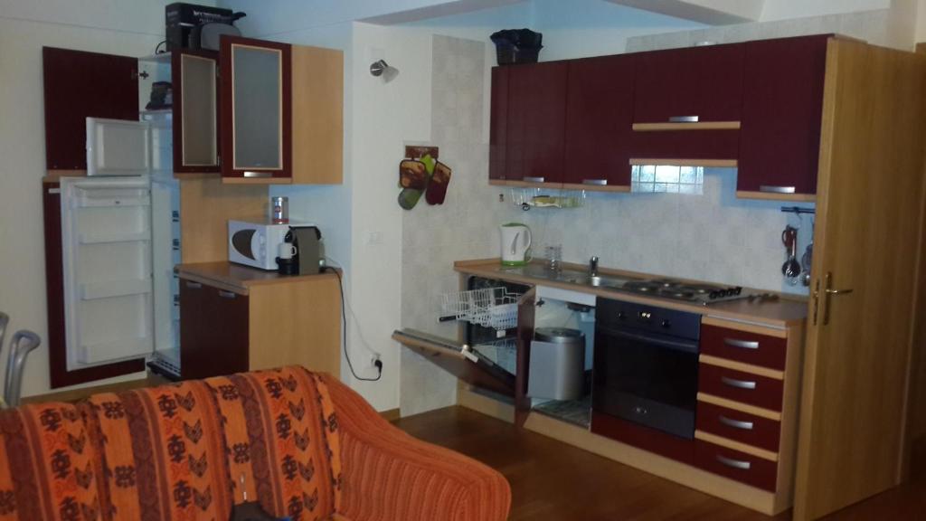 Kuchyň nebo kuchyňský kout v ubytování Apartment Albaré Residence