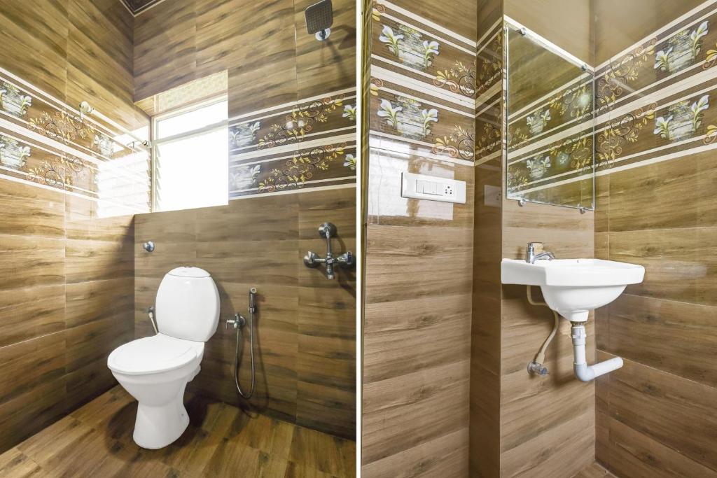 Koupelna v ubytování Super Hotel O Porvorim Near Mall De Goa