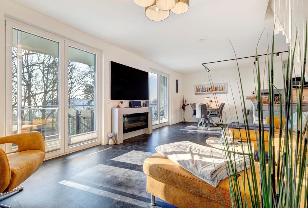 Μια τηλεόραση ή/και κέντρο ψυχαγωγίας στο Apartment "Inselliebe"