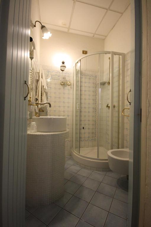 Koupelna v ubytování Hotel Cherubini