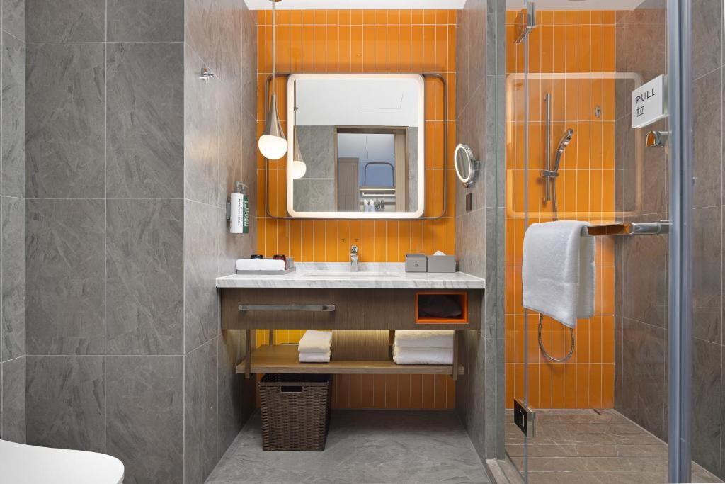 Koupelna v ubytování Home2 Suite by Hilton Chaozhou