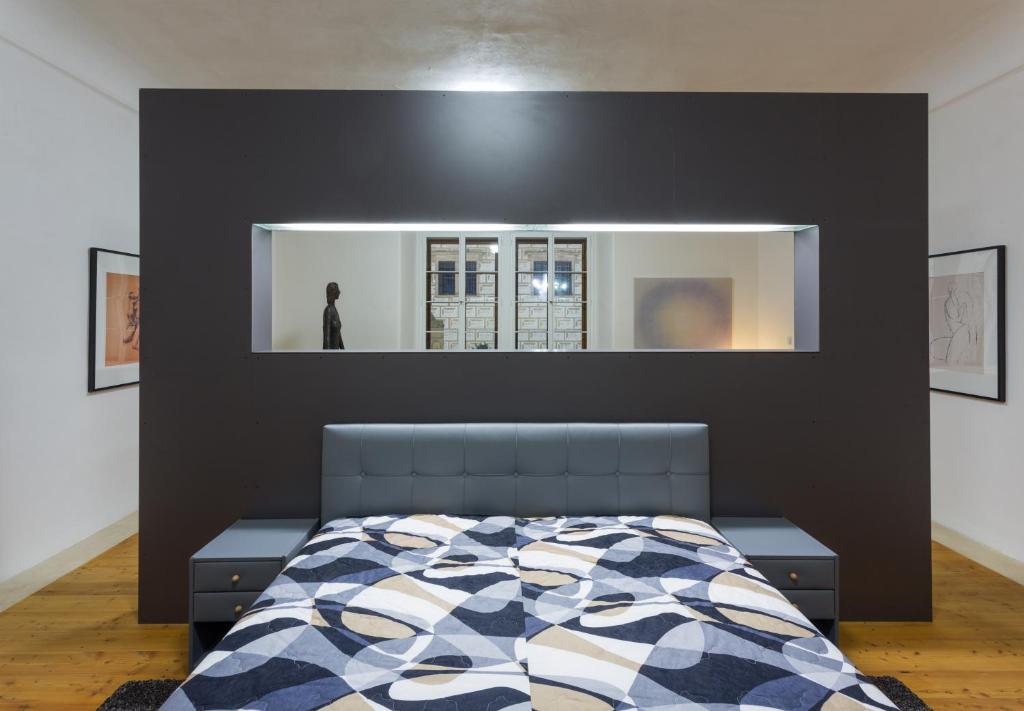 Letto o letti in una camera di Zámecké apartmány Litomyšl