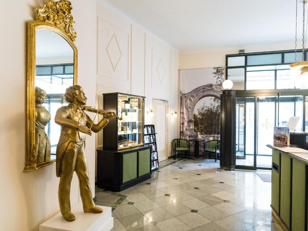 Kuchyň nebo kuchyňský kout v ubytování Hotel Johann Strauss
