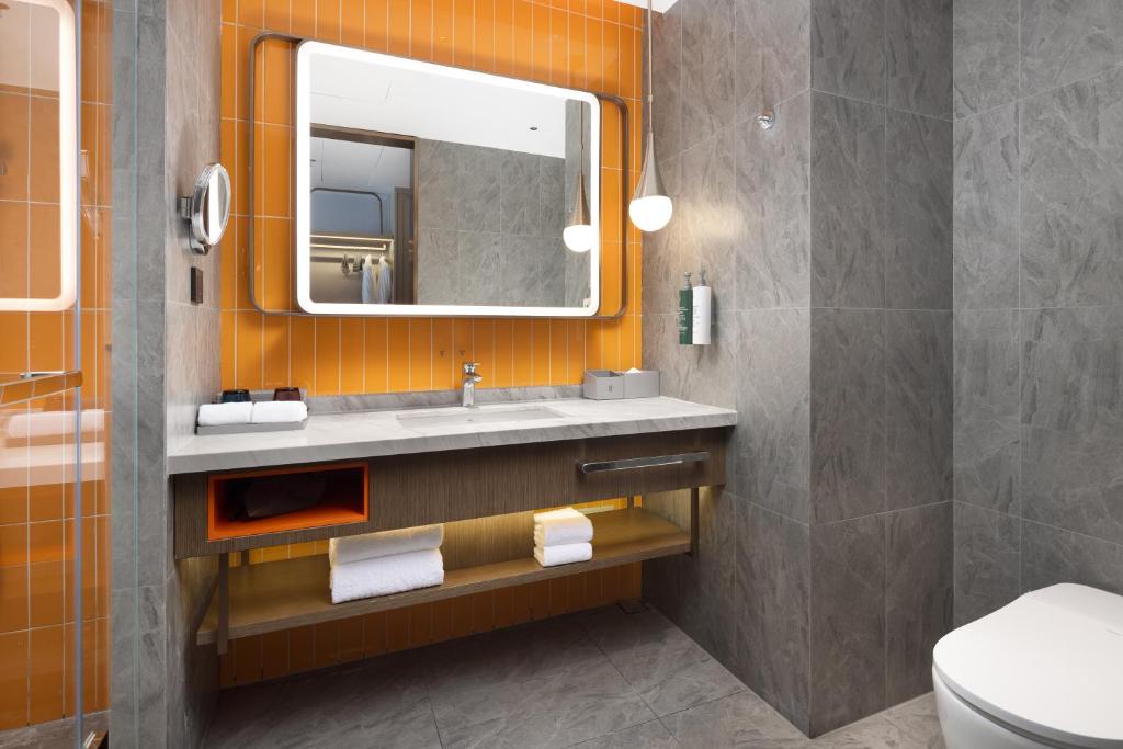 Koupelna v ubytování Home2 Suite by Hilton Chaozhou