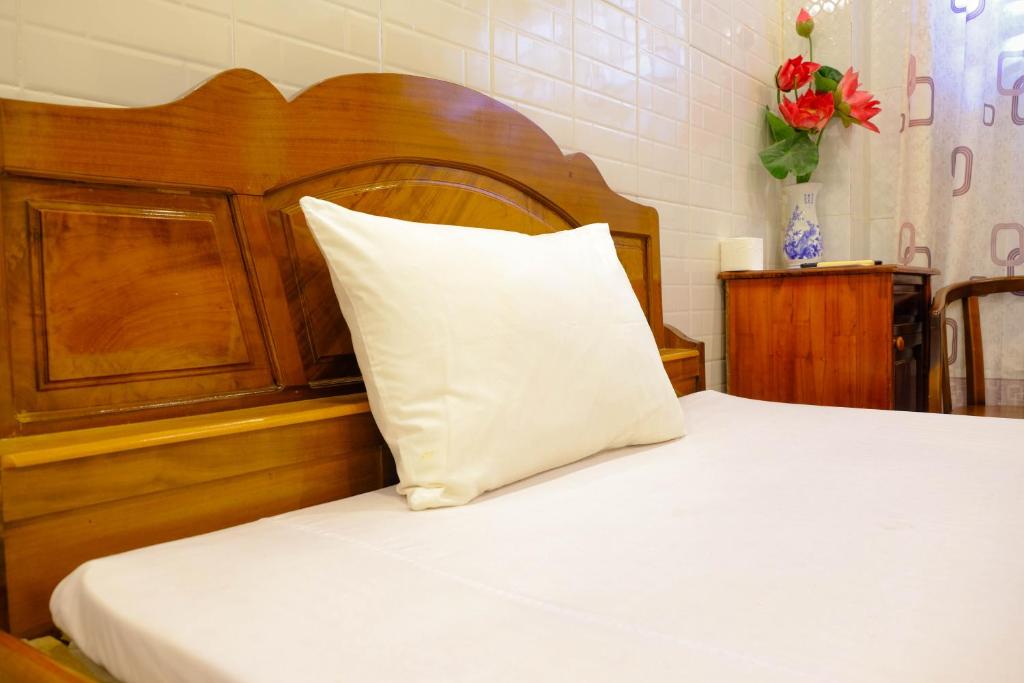 Postel nebo postele na pokoji v ubytování Lucky Hội an Hotel