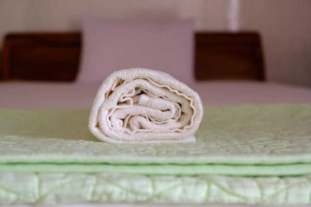 Postel nebo postele na pokoji v ubytování Lucky Hội an Hotel