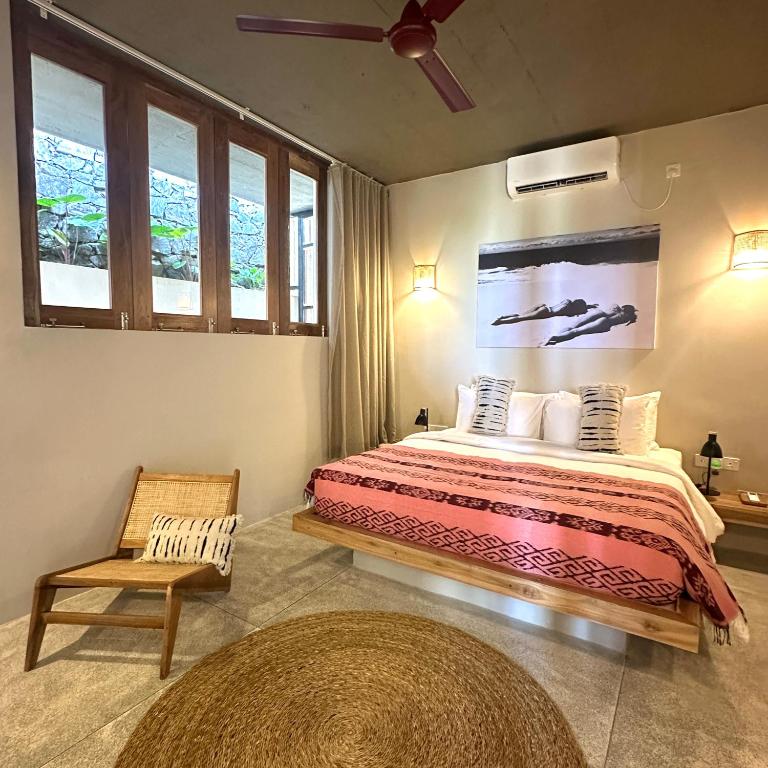 Postel nebo postele na pokoji v ubytování La Playa Villas Hiriketiya
