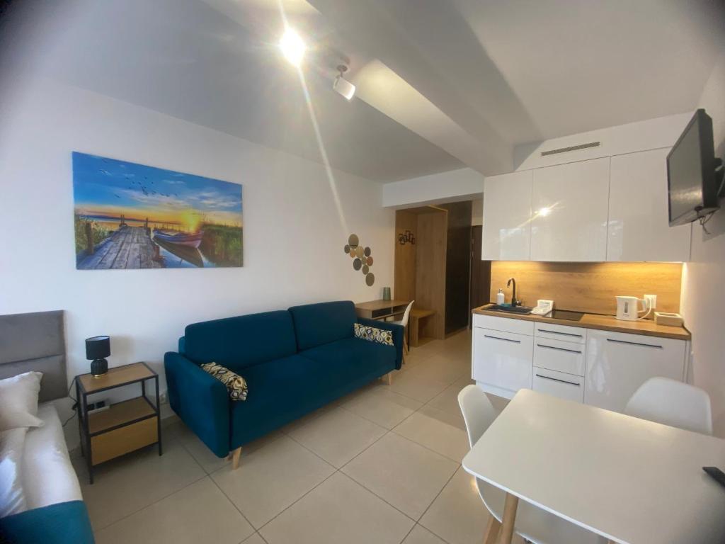Kuchyňa alebo kuchynka v ubytovaní Apartament 103 Planeta, 100 m od plaży
