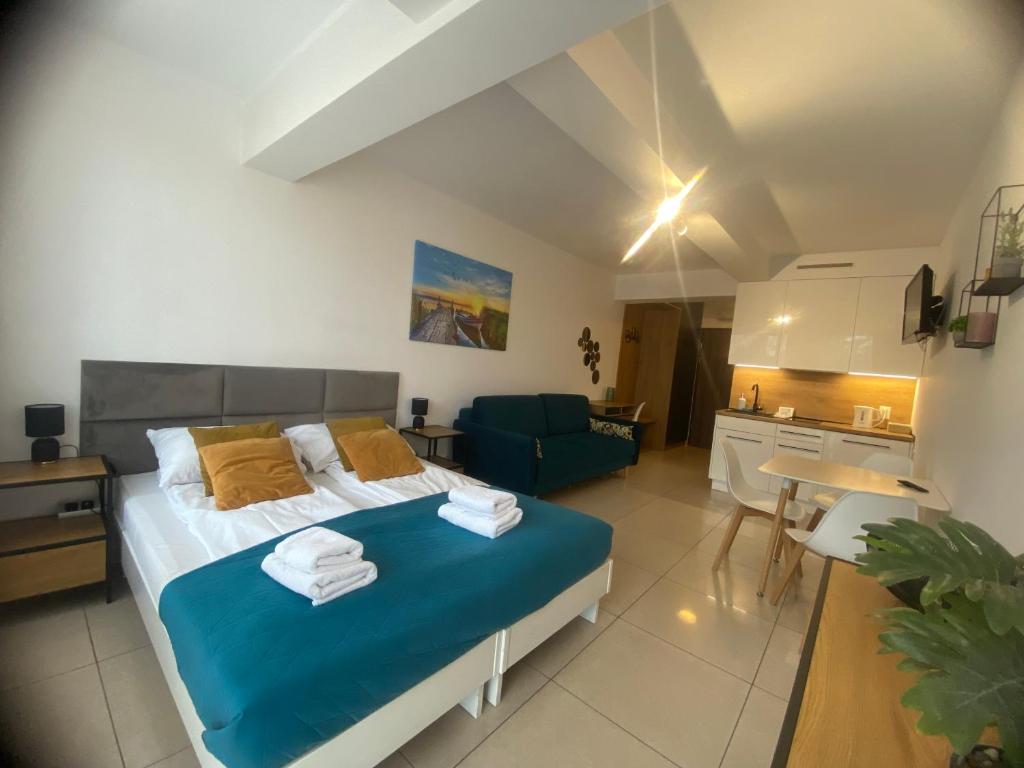 Posteľ alebo postele v izbe v ubytovaní Apartament 103 Planeta, 100 m od plaży