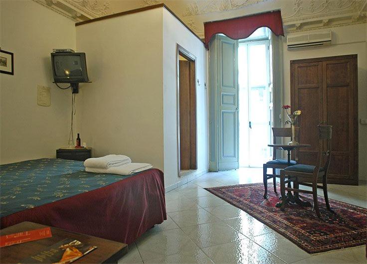 Posteľ alebo postele v izbe v ubytovaní B&B Miseria e Nobilta'